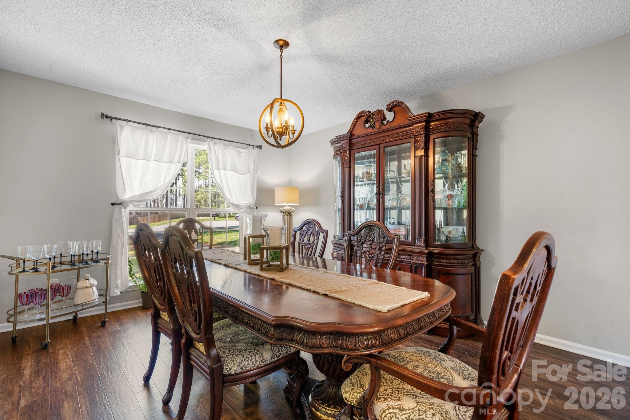 120 Wesley Court Crouse, NC 28033 - Photo 20 of 36 a view of a dining room with furniture window and wooden floor
