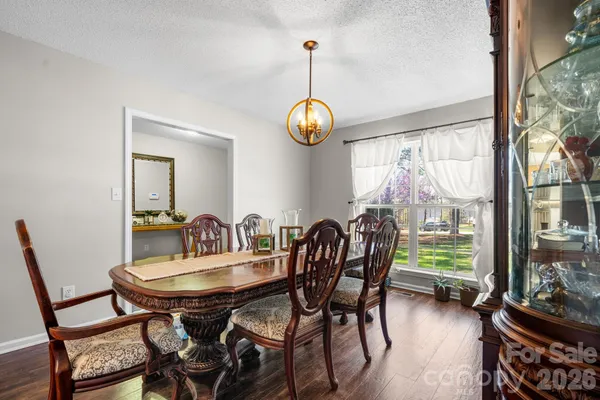 a bed room with a bed and a television