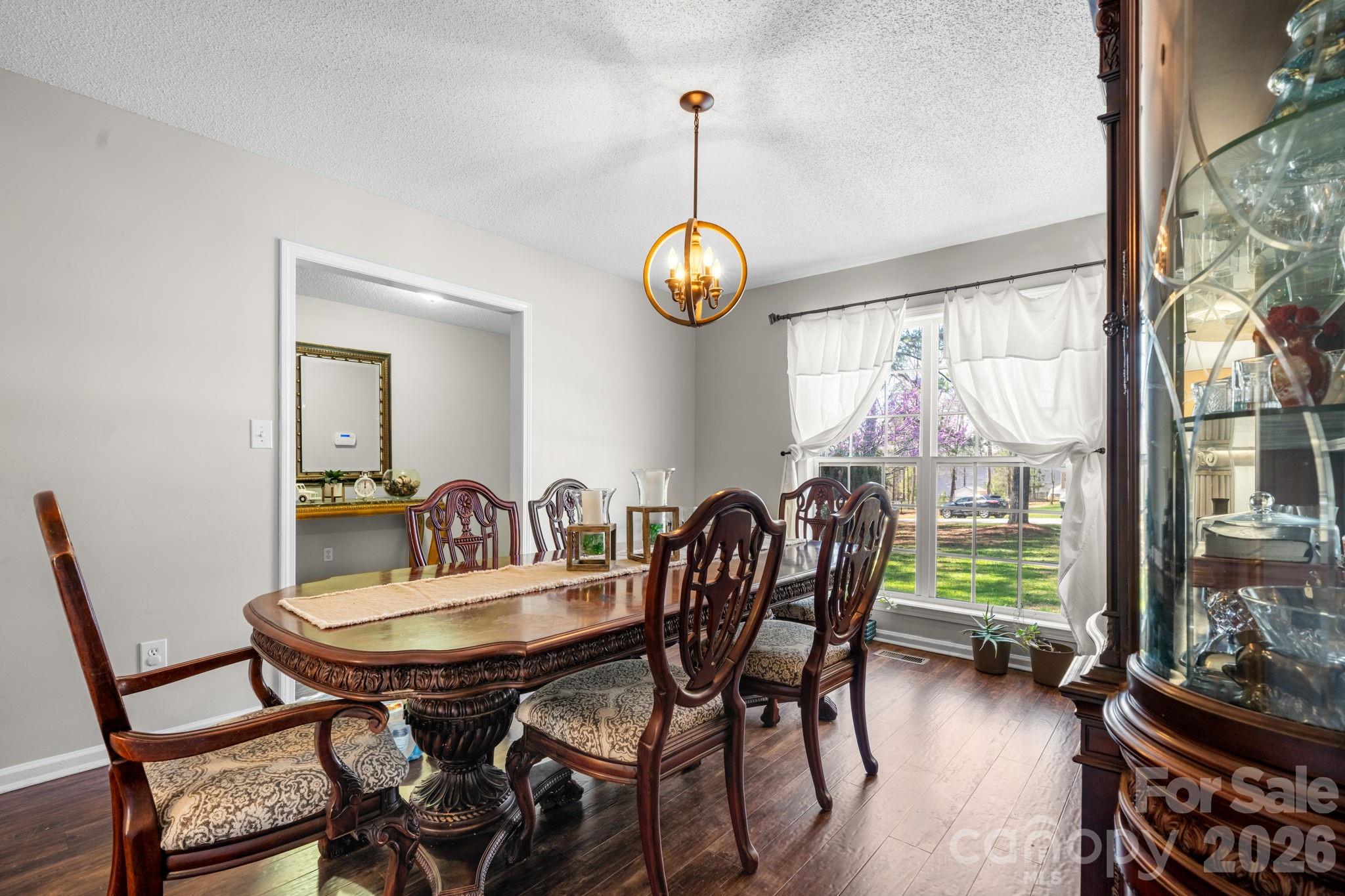 120 Wesley Court Crouse, NC 28033 - Photo 21 of 36 a view of a dining room with furniture window and outside view