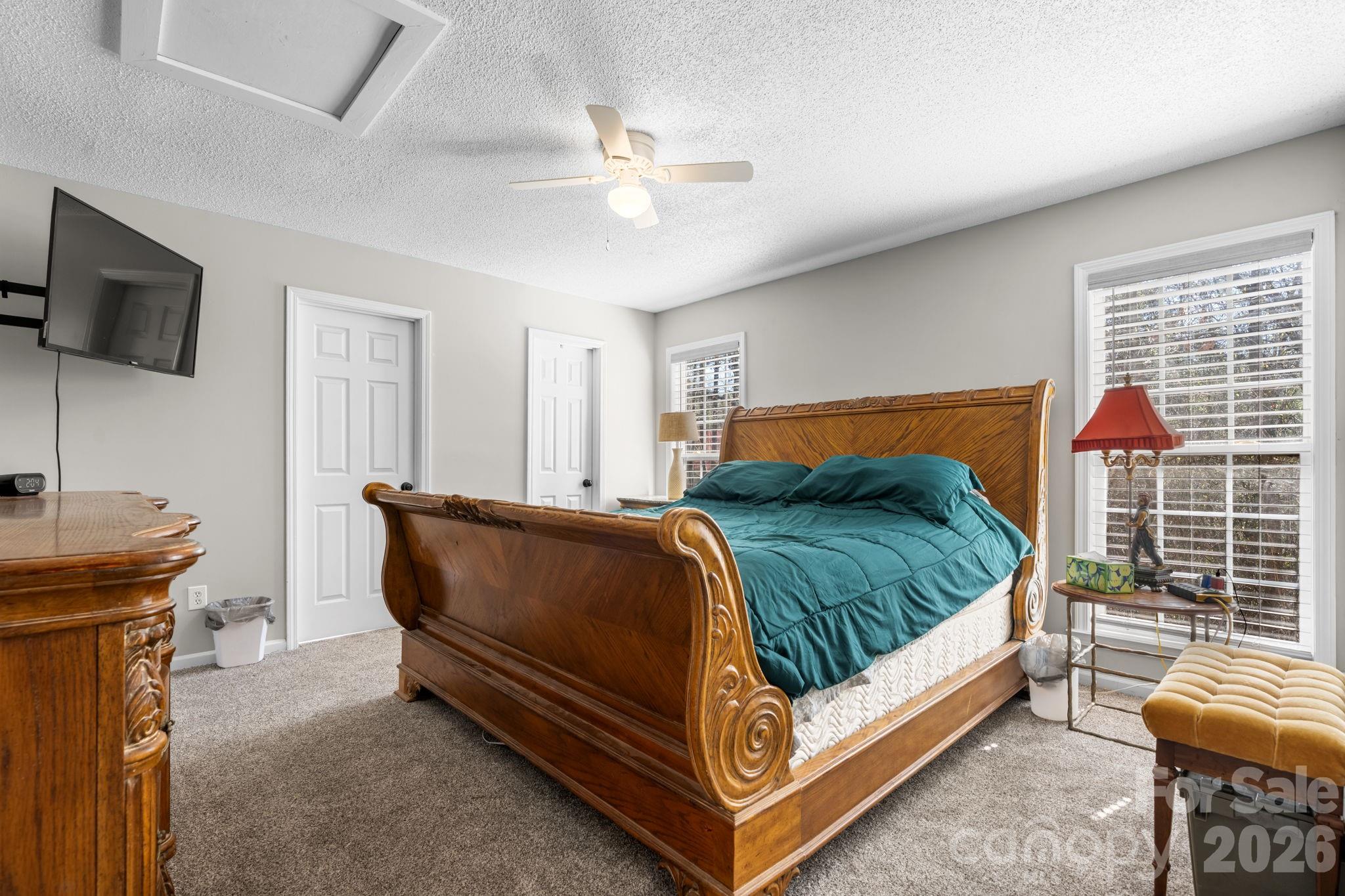 120 Wesley Court Crouse, NC 28033 - Photo 22 of 36 a bed room with a bed and a television