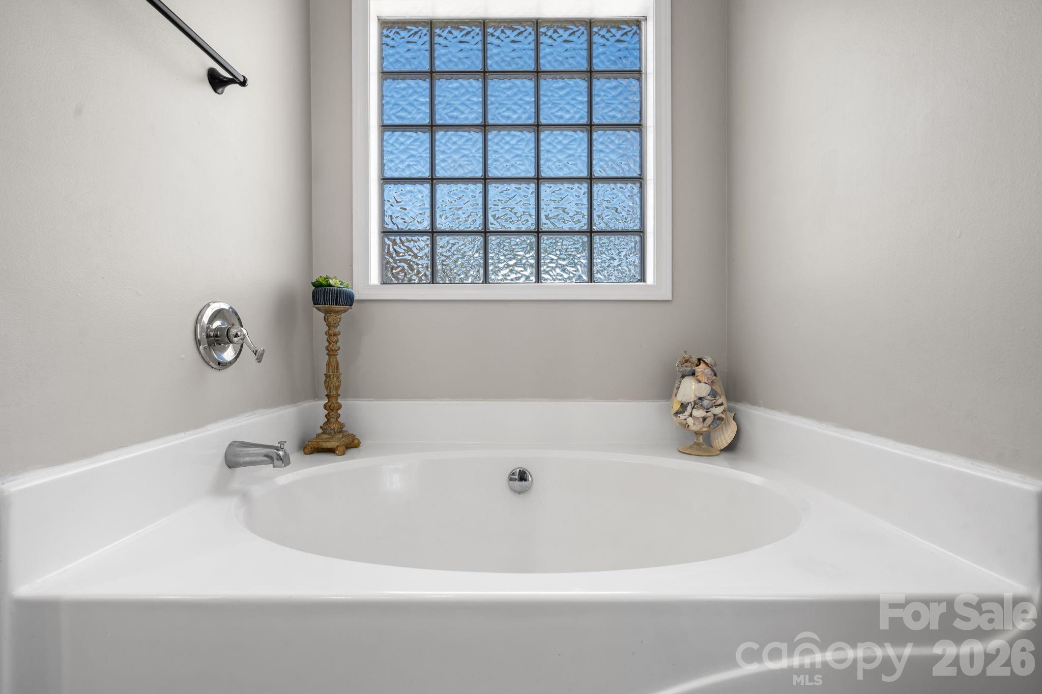 120 Wesley Court Crouse, NC 28033 - Photo 26 of 36 a white bath tub sitting in a bathroom