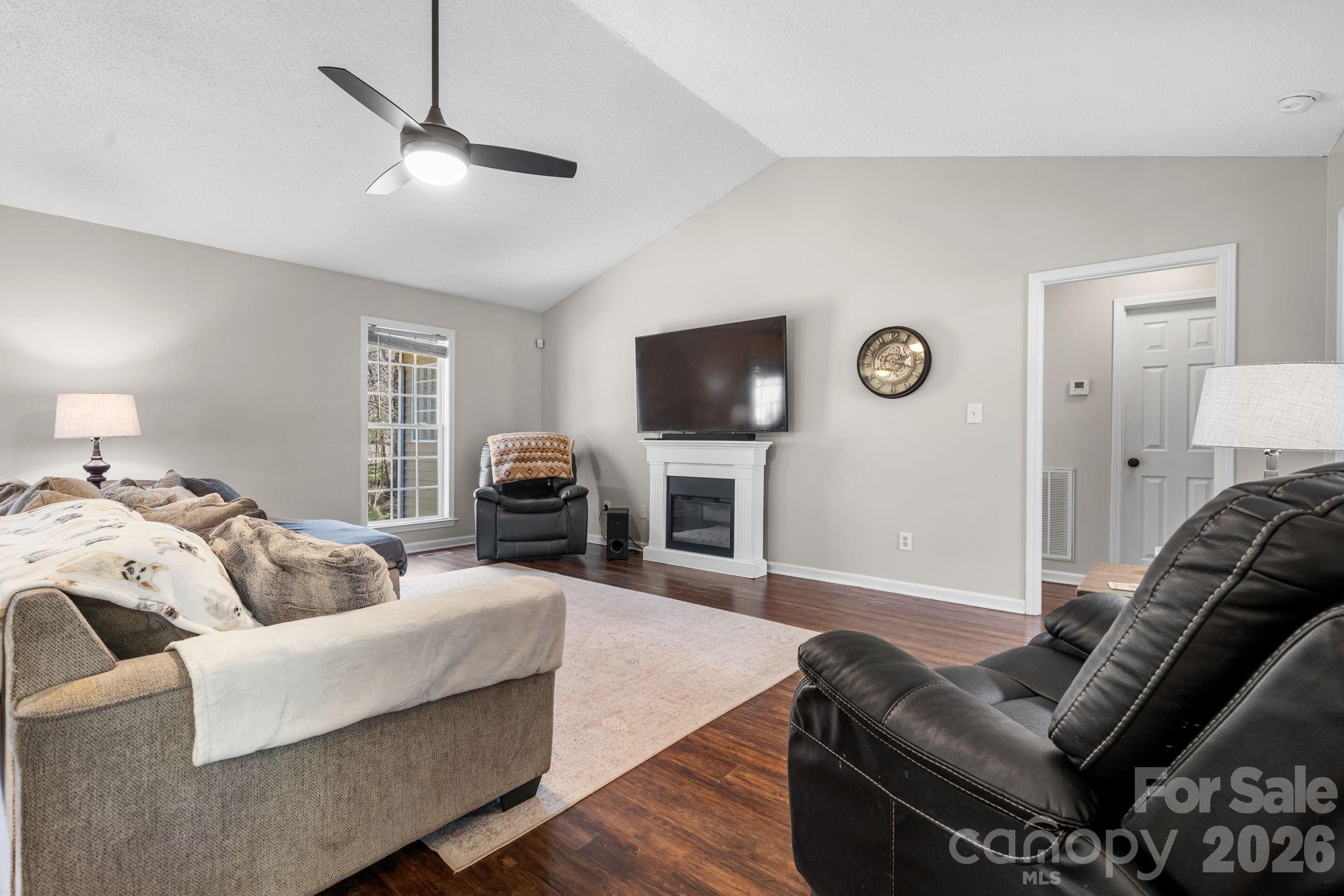 120 Wesley Court Crouse, NC 28033 - Photo 31 of 36 a living room with furniture and a flat screen tv