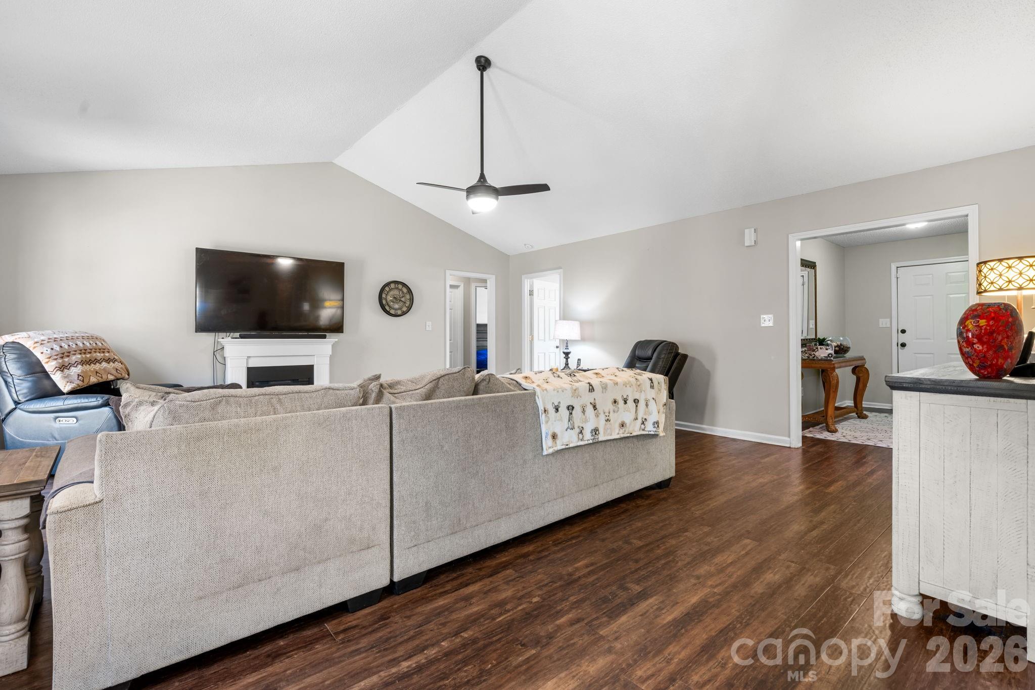 120 Wesley Court Crouse, NC 28033 - Photo 32 of 36 a living room with furniture and a flat screen tv