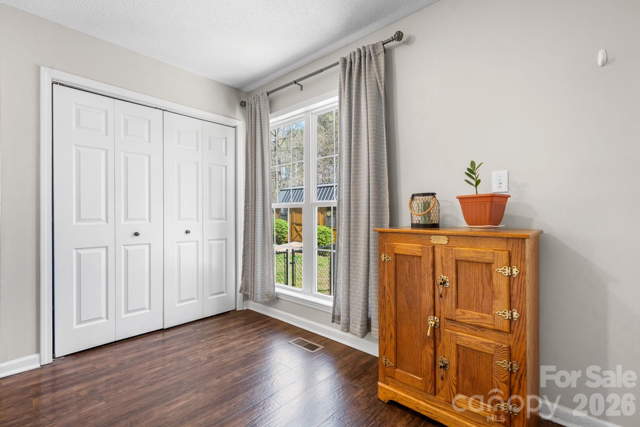 120 Wesley Court Crouse, NC 28033 - Photo 33 of 36 a view of a hallway with wooden floor and closet area