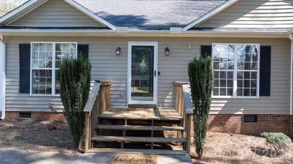 a front view of a house with a porch