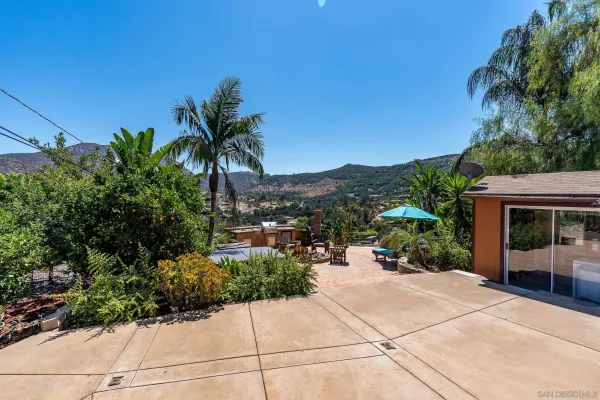 a view of swimming pool with a patio