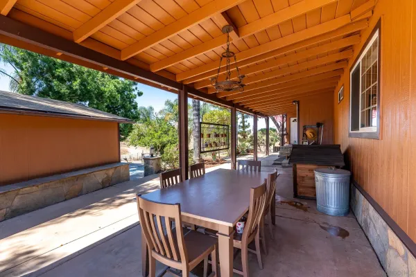 a view of a backyard of the house