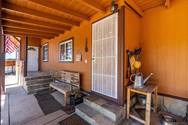 a view of house with outdoor space and garden