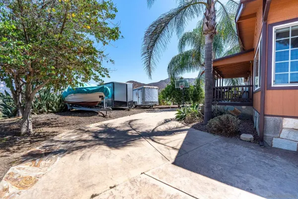 a view of a parking space in back of a building
