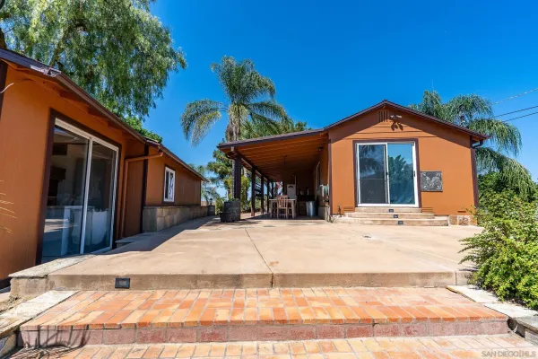 a utility room with dryer washer and a window