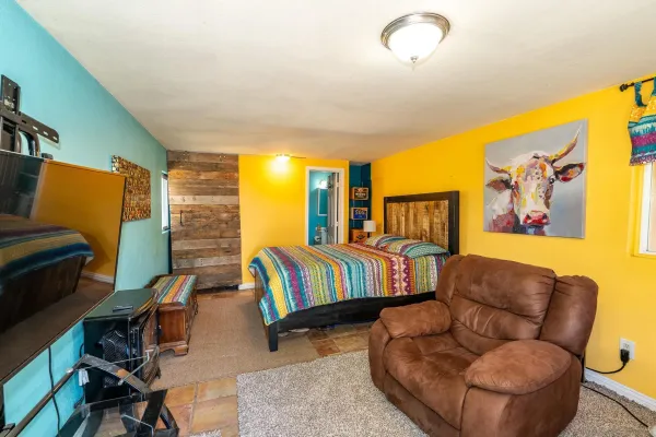 a view of a livingroom with furniture and storage