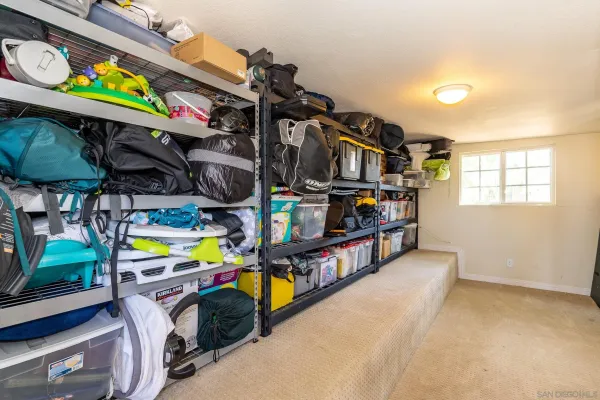 a view of outdoor space with deck and trees