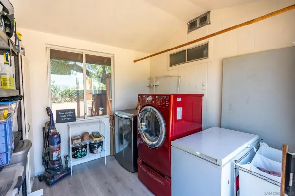 an aerial view of residential house with an outdoor space and mountain view