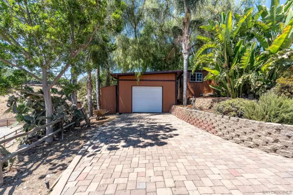 a view of lot of plant and tennis court