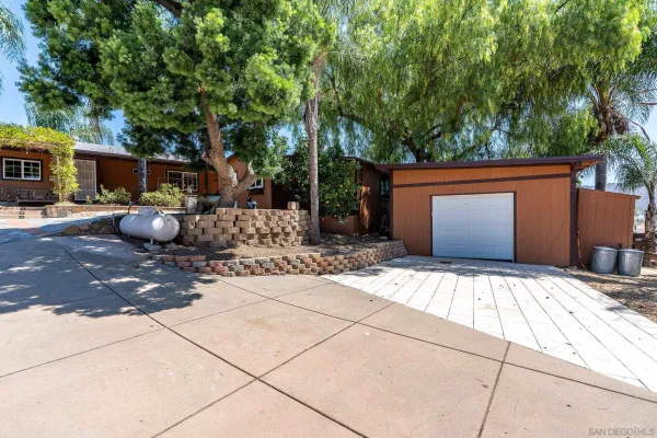 a view of a city with mountains in the background