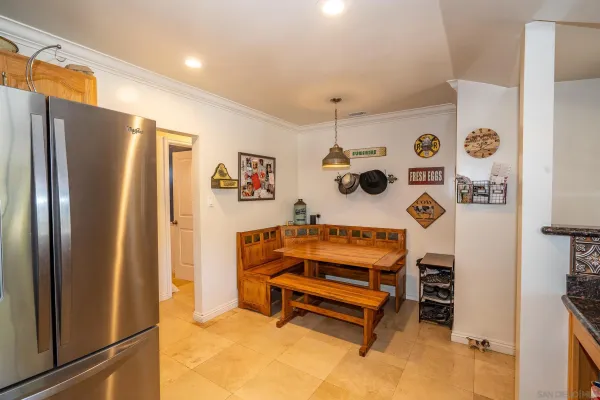a living room with furniture a couch and a window