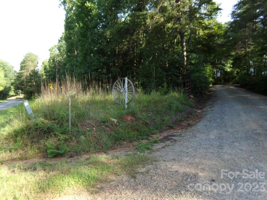 Lot 2 State Line Road Mooresboro, NC 28114 - Photo 5 of 7 a view of a lake with a yard
