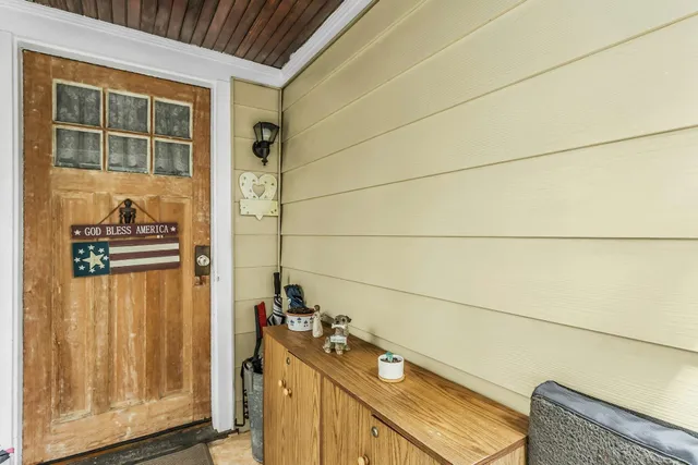 a bathroom with a sink and vanity
