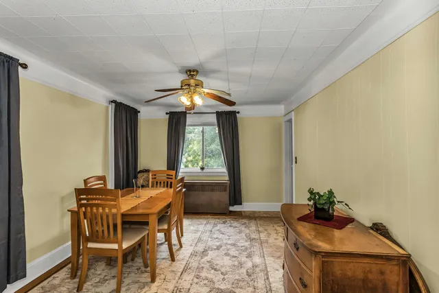 a workspace with furniture and window