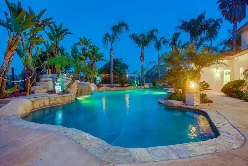 2150 Corte Cidro Carlsbad, CA 92009 - Photo 1 of 49 a view of a swimming pool with a yard