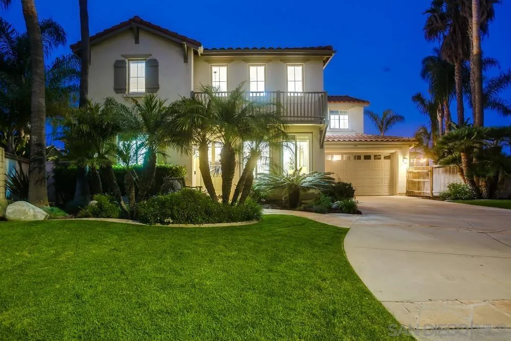 2150 Corte Cidro Carlsbad, CA 92009 - Photo 2 of 49 a front view of a house with a yard