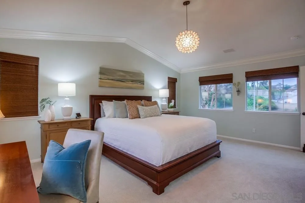 2150 Corte Cidro Carlsbad, CA 92009 - Photo 28 of 49 a bedroom with a bed and window