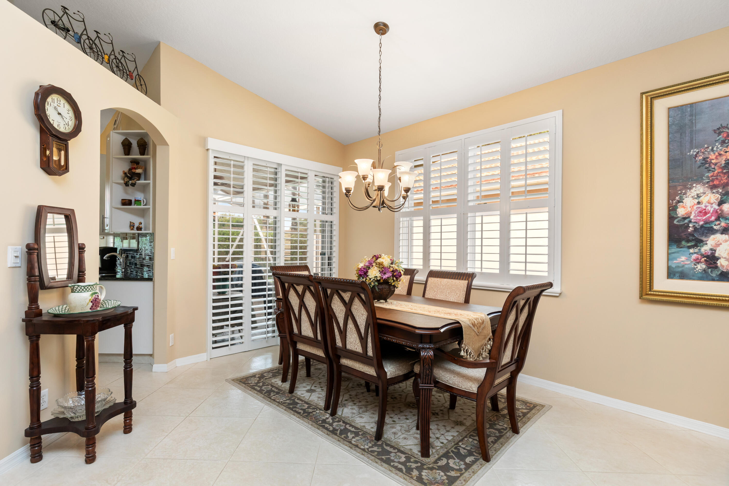 6698 Vía Roma Delray Beach, FL 33446 - Photo 5 of 50 a view of a dining room with furniture and window