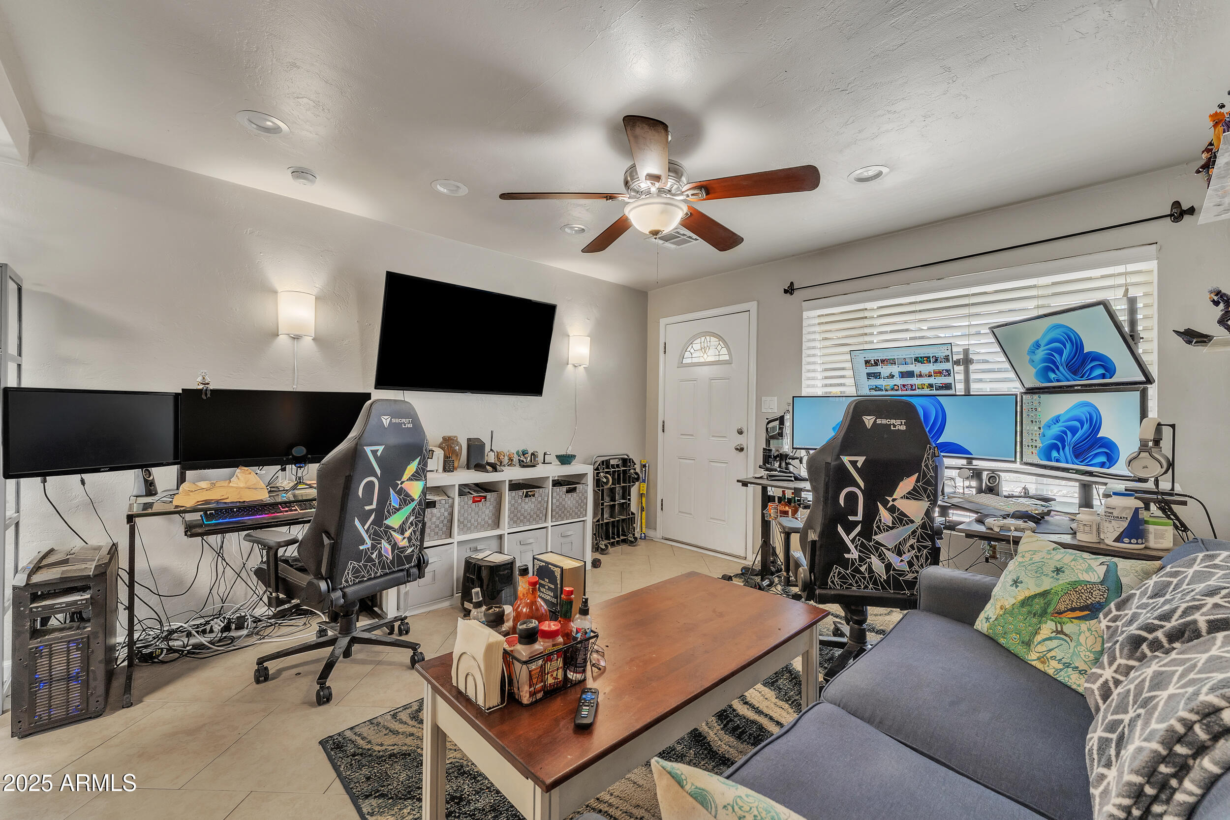 1024 East Mitchell Drive Phoenix, AZ 85014 - Photo 27 of 44 a living room with furniture and a flat screen tv