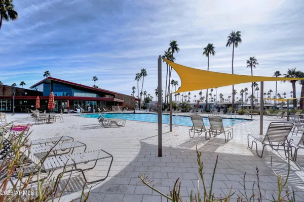 a view of a street with a building in the background