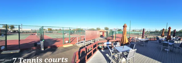 a view of a ocean with a building in the background