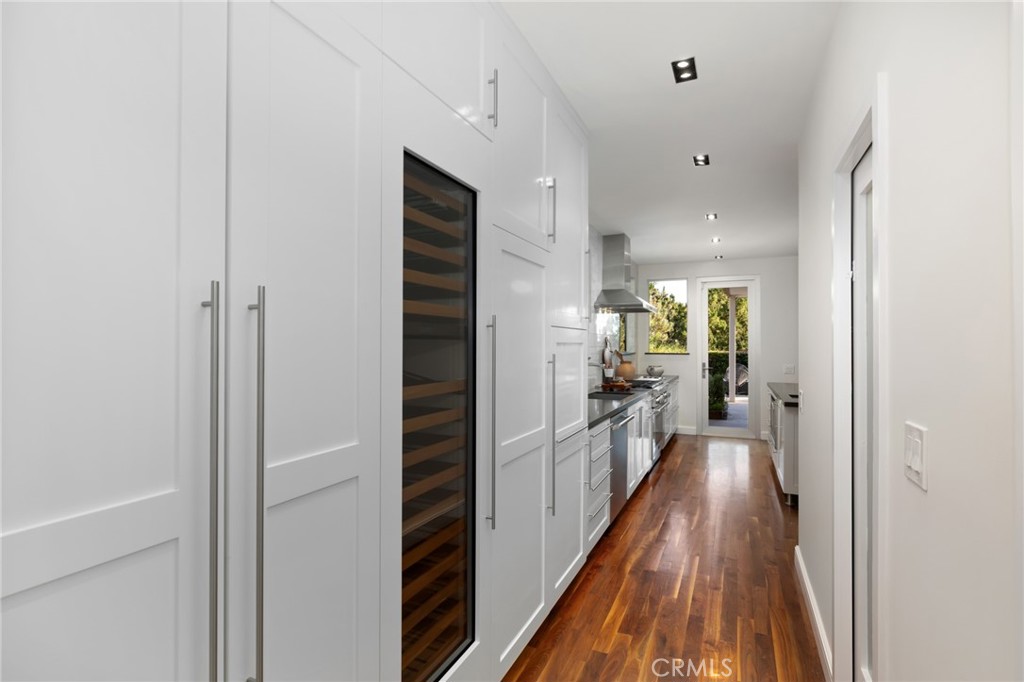 598 Camillo Road Sierra Madre, CA 91024 - Photo 26 of 75 a view of a hallway with wooden floor