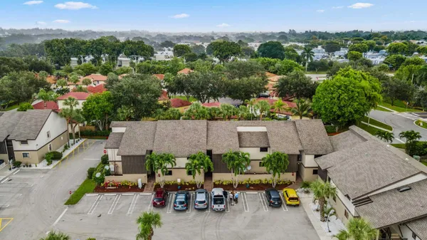 an aerial view of a house with a garden