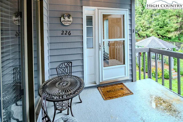 a view of a two chair in the balcony