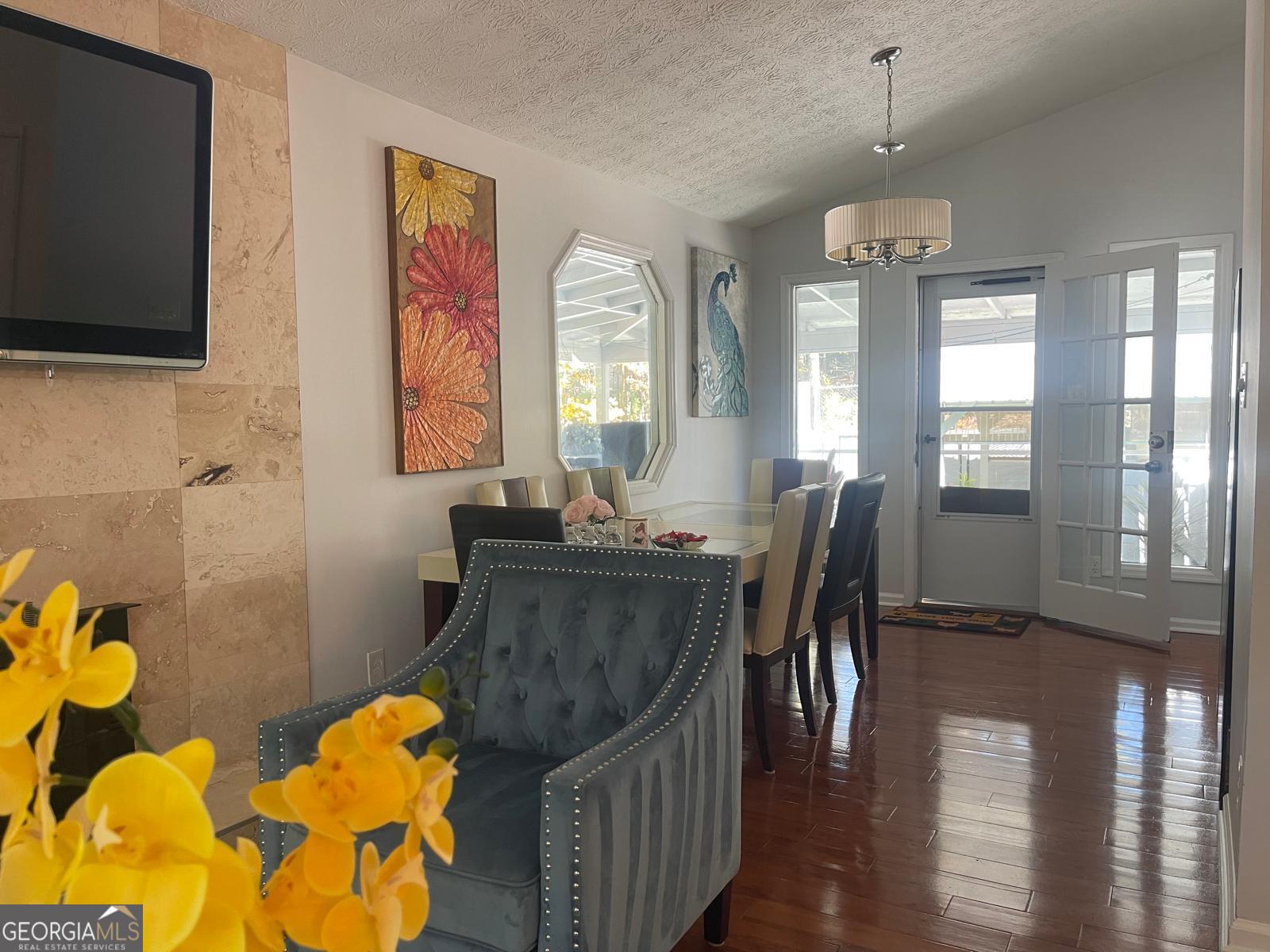 5421 Burdette Road Southeast Mableton, GA 30126 - Photo 23 of 64 a view of a dining room with furniture and windows