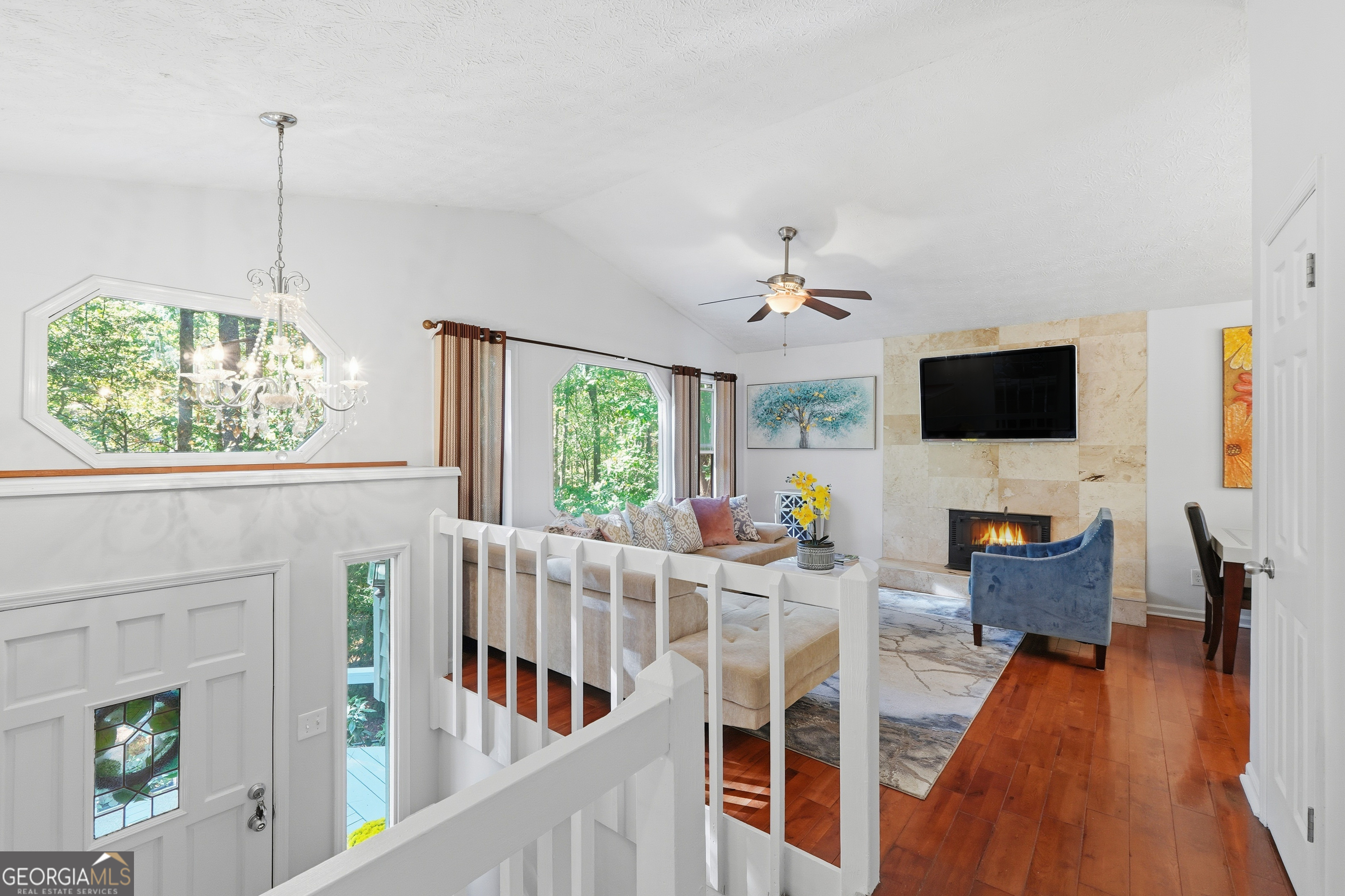5421 Burdette Road Southeast Mableton, GA 30126 - Photo 30 of 64 a living room with furniture and a flat screen tv