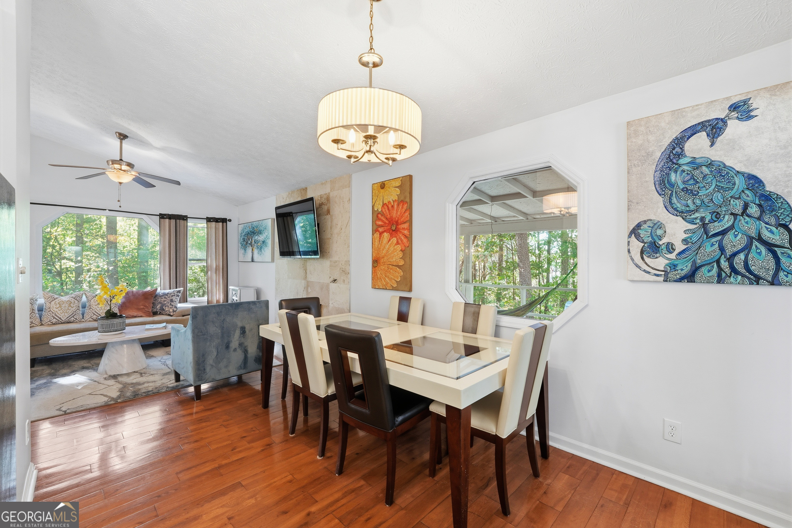 5421 Burdette Road Southeast Mableton, GA 30126 - Photo 35 of 64 a view of a dining room with furniture wooden floor and a chandelier