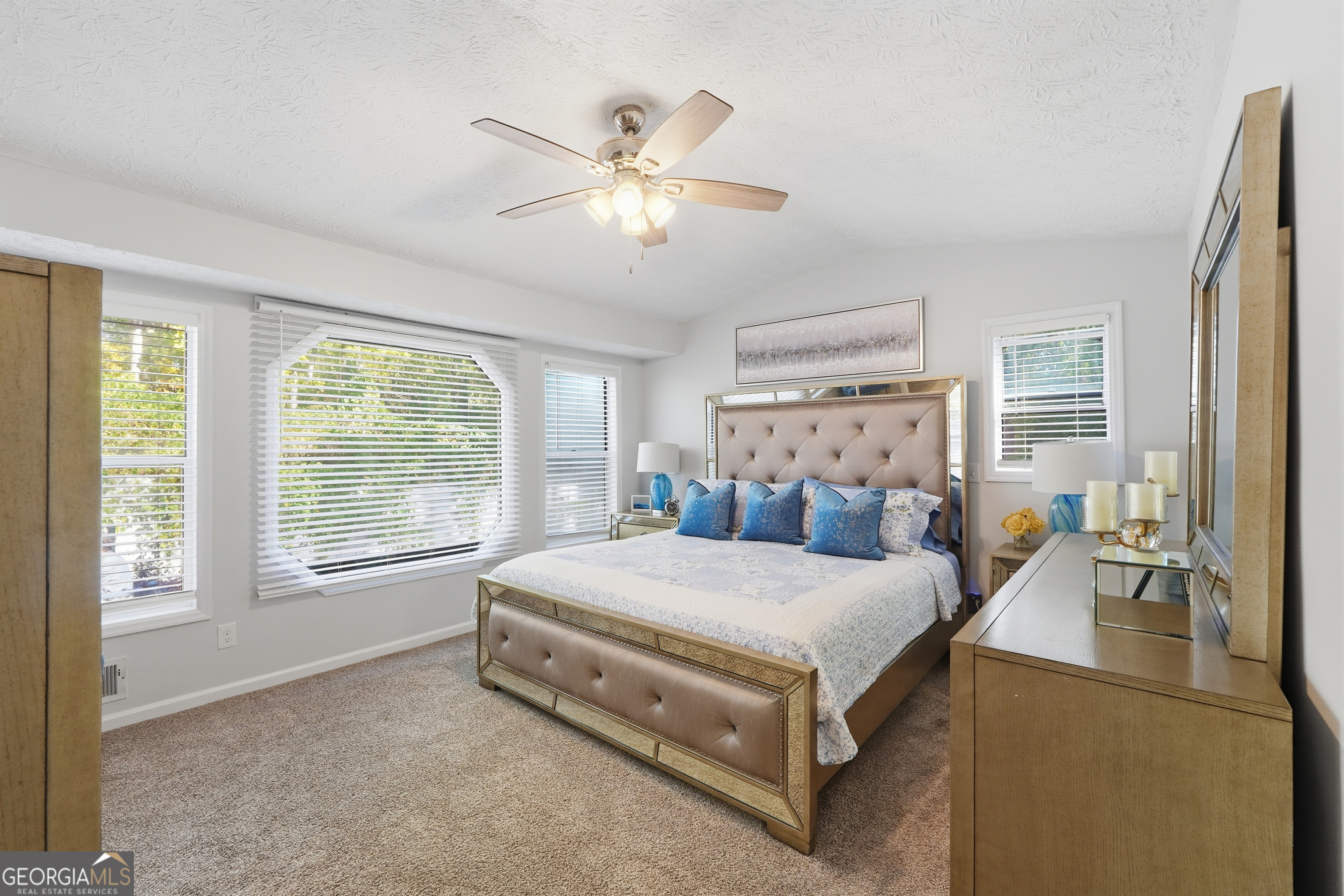 5421 Burdette Road Southeast Mableton, GA 30126 - Photo 36 of 64 a bed sitting in a bedroom next to a window