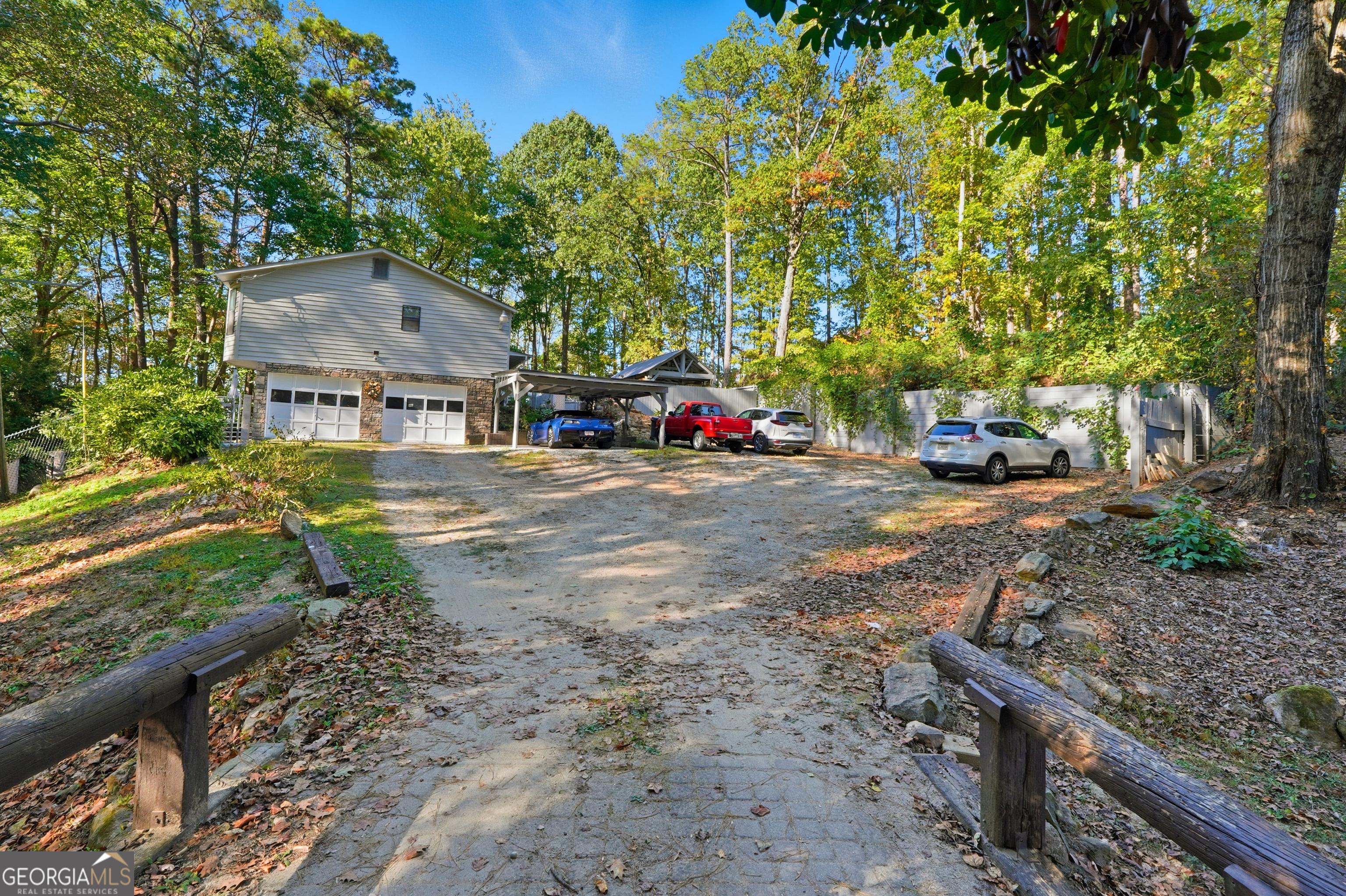 5421 Burdette Road Southeast Mableton, GA 30126 - Photo 54 of 64 a view of a car park in front of a house