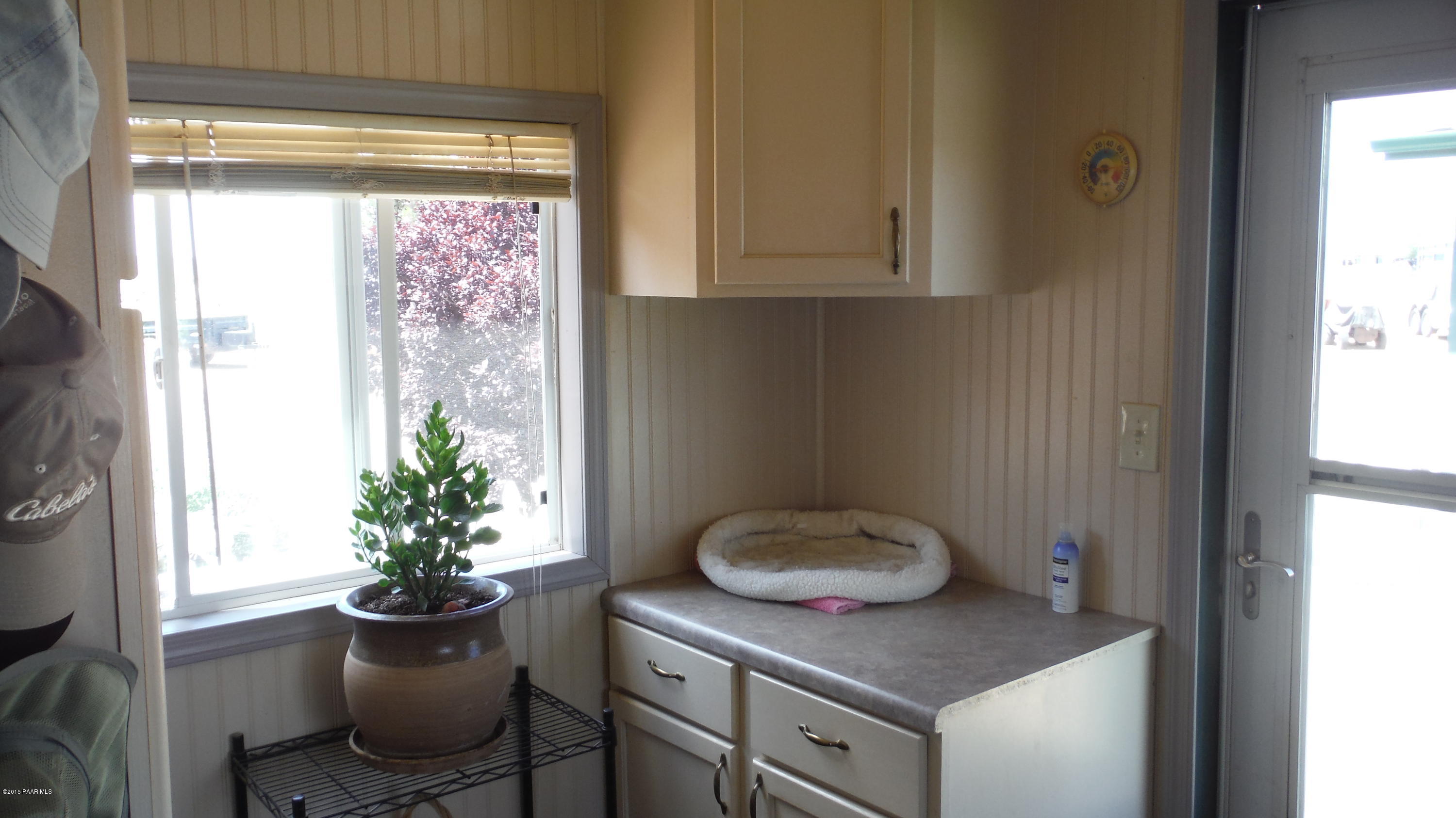 25356 North High Desert Road Paulden, AZ 86334 - Photo 28 of 56 a bathroom with a granite countertop sink and a mirror