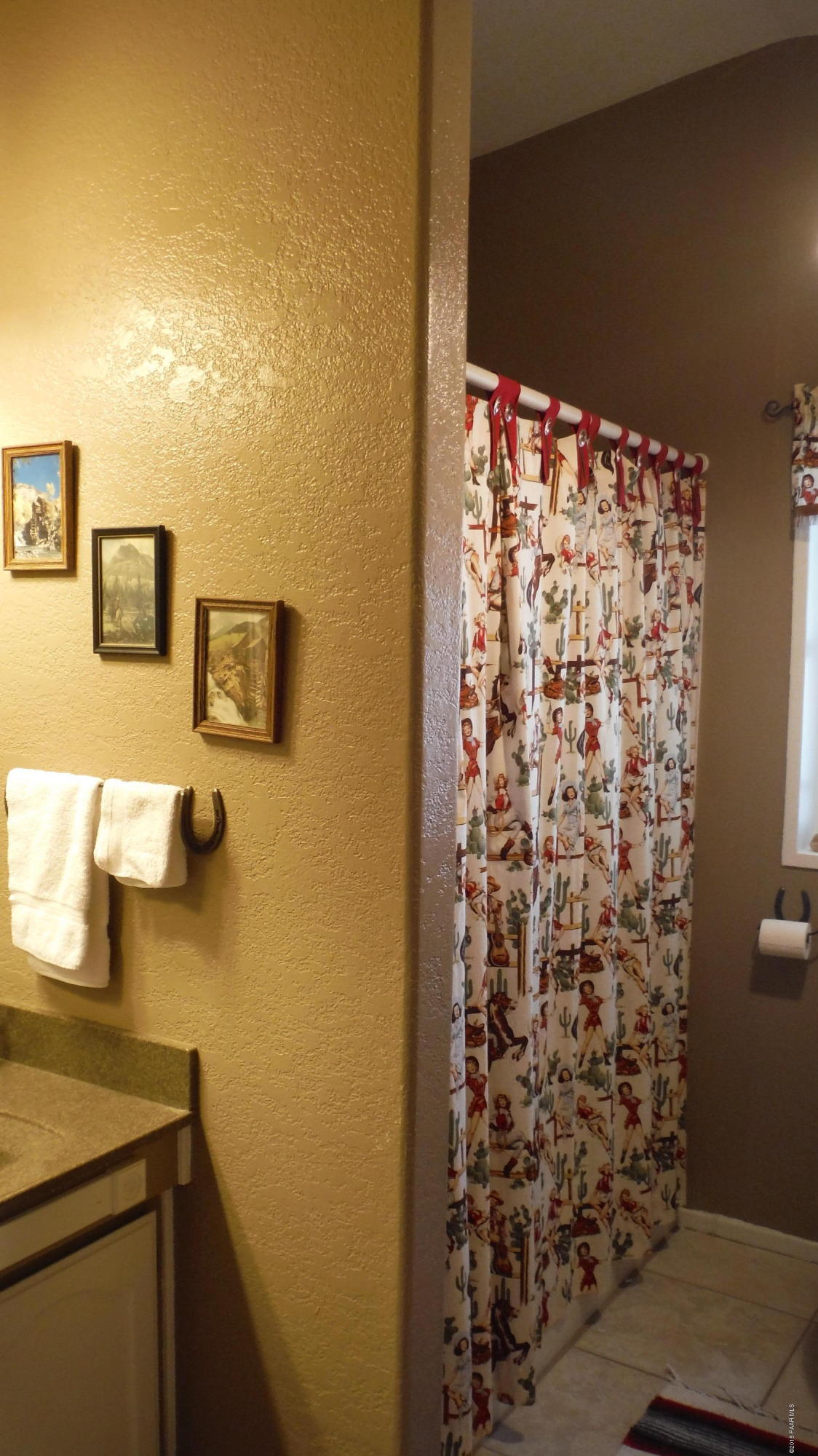 25356 North High Desert Road Paulden, AZ 86334 - Photo 36 of 56 a bathroom with a sink toilet and shower