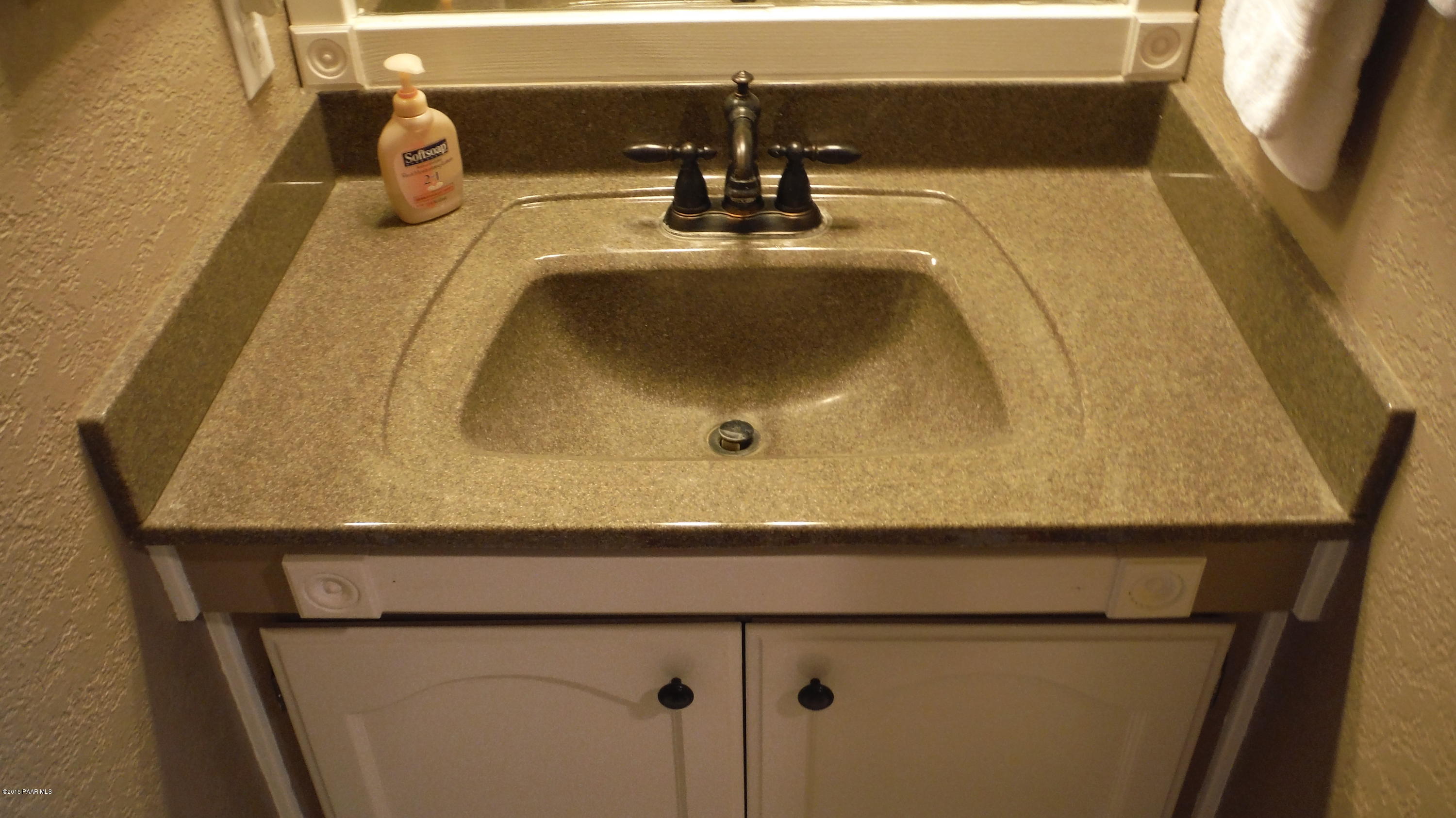 25356 North High Desert Road Paulden, AZ 86334 - Photo 38 of 56 a bathroom with a sink and mirror