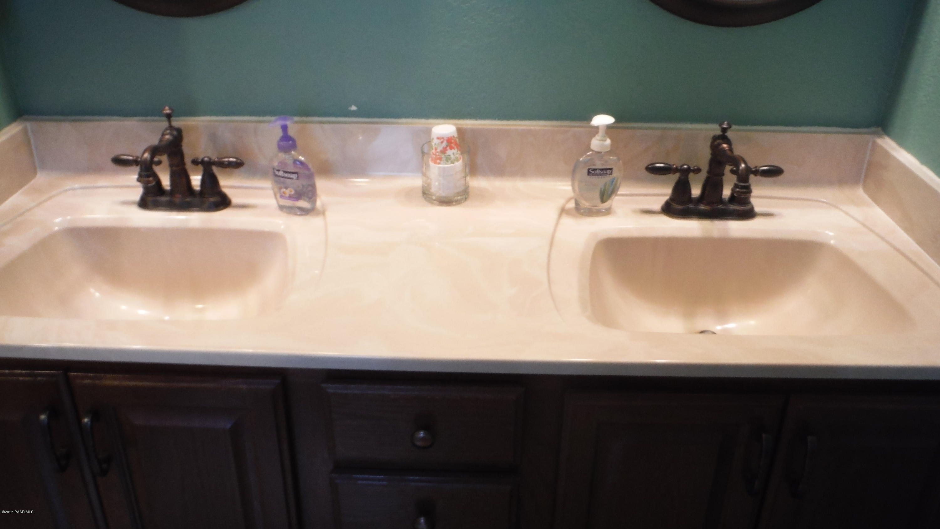 25356 North High Desert Road Paulden, AZ 86334 - Photo 40 of 56 a bathroom with a sink and a mirror