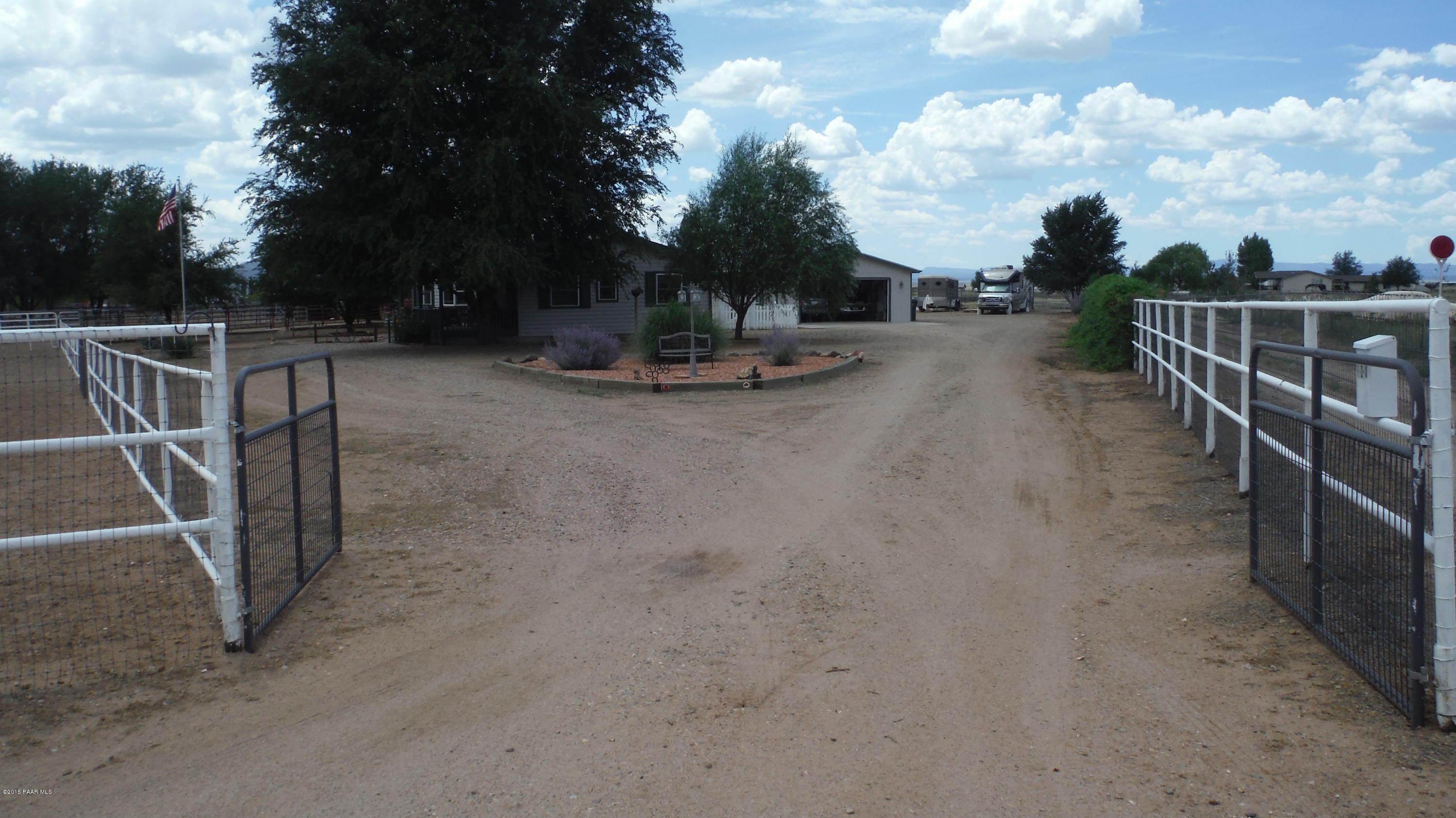 25356 North High Desert Road Paulden, AZ 86334 - Photo 54 of 56 a view of a park with swings and slides