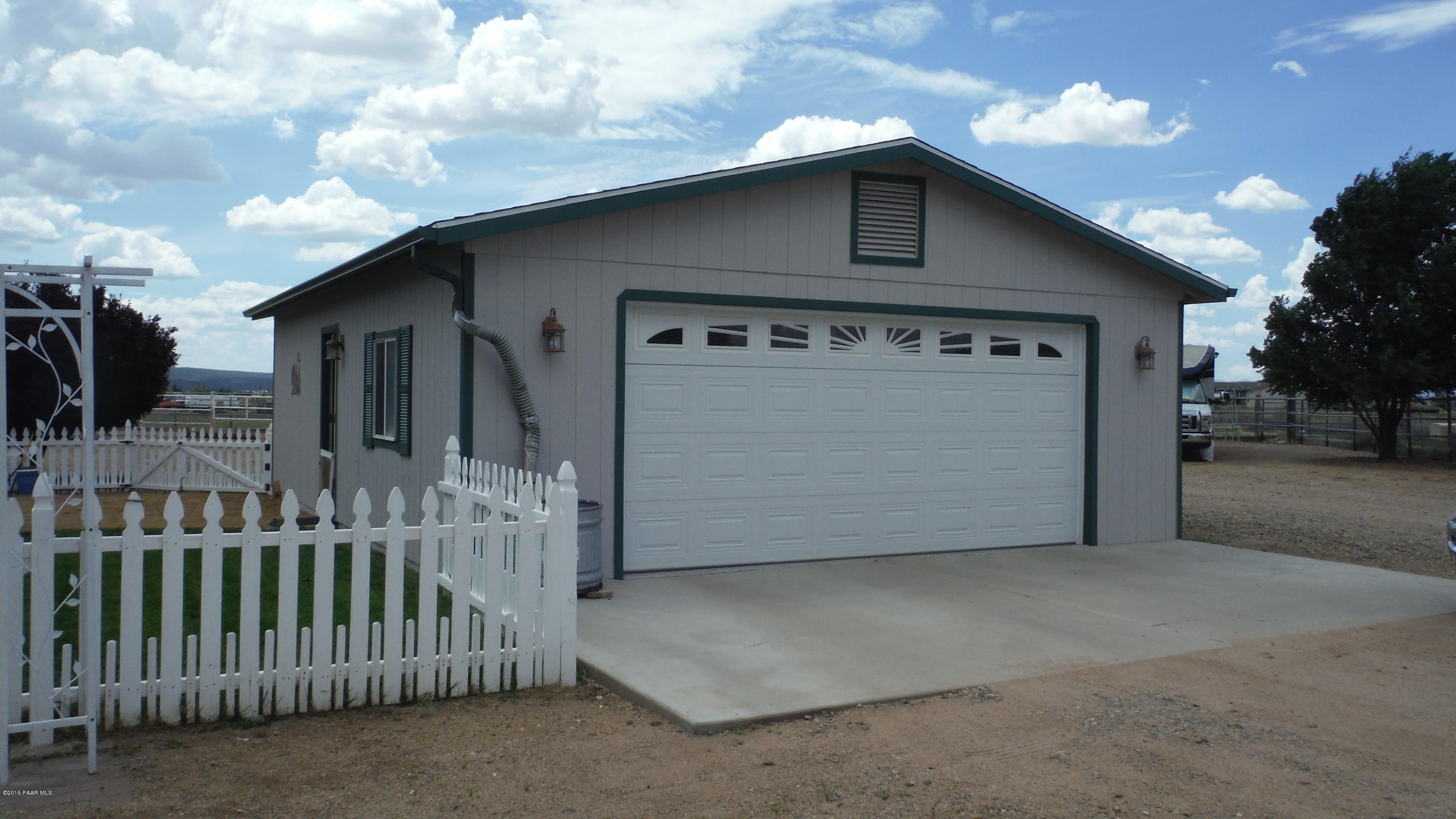 25356 North High Desert Road Paulden, AZ 86334 - Photo 8 of 56 a view of a house with a garage