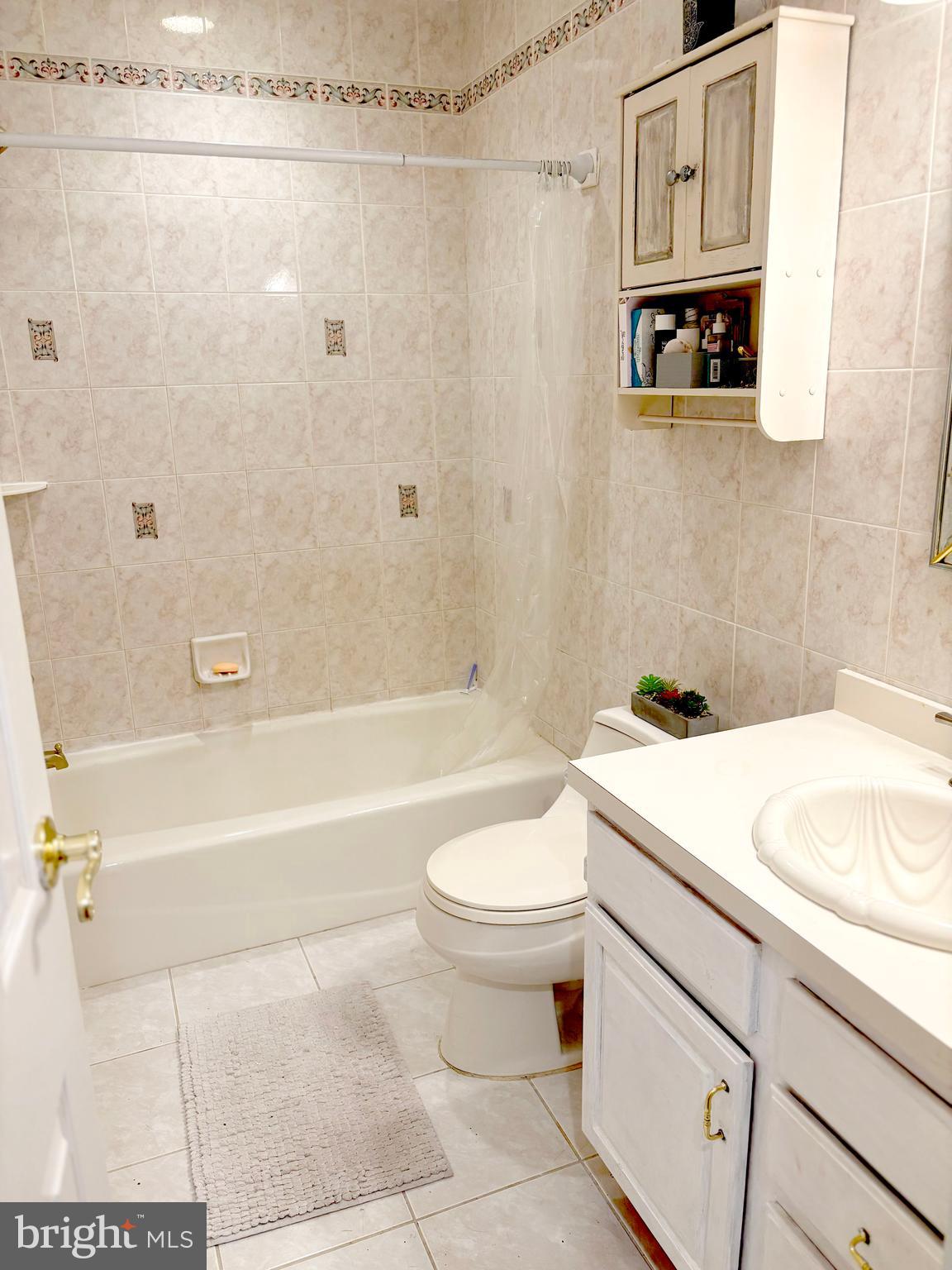 52 Michael Road Hammonton, NJ 08037 - Photo 20 of 30 a bathroom with a sink a toilet and a bathtub