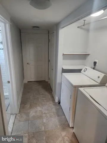 a view of utility room with washer and dryer