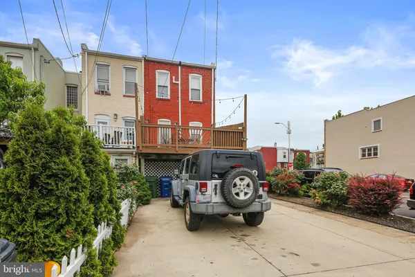 a car parked in front of a building