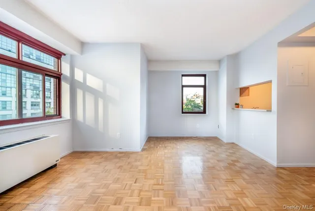 a view of an empty room and window