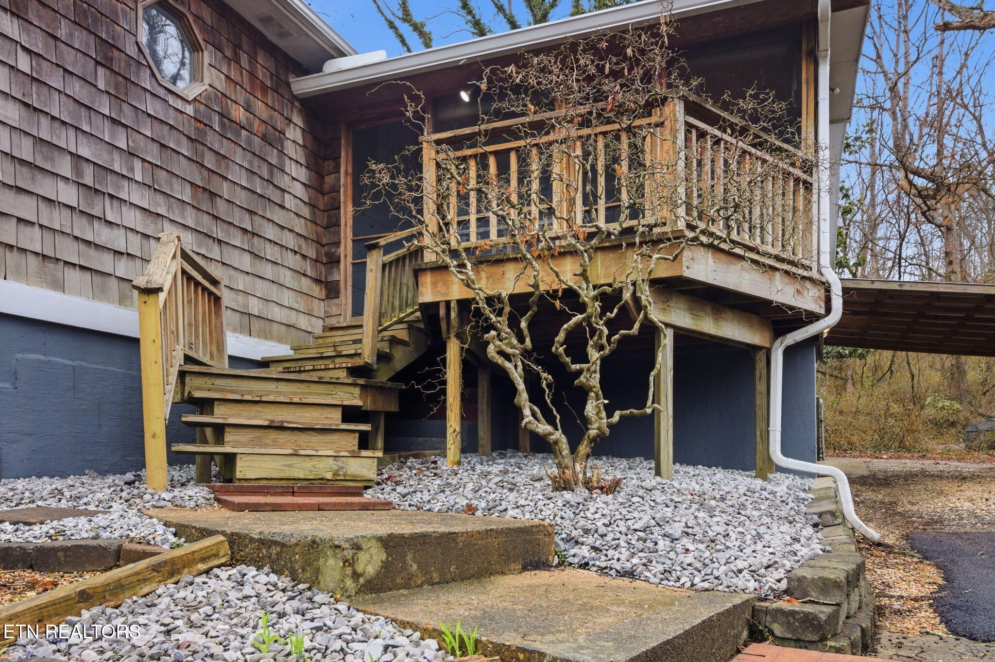 353 East Wolf Valley Road Heiskell, TN 37754 - Photo 2 of 34 a view of a house with a yard