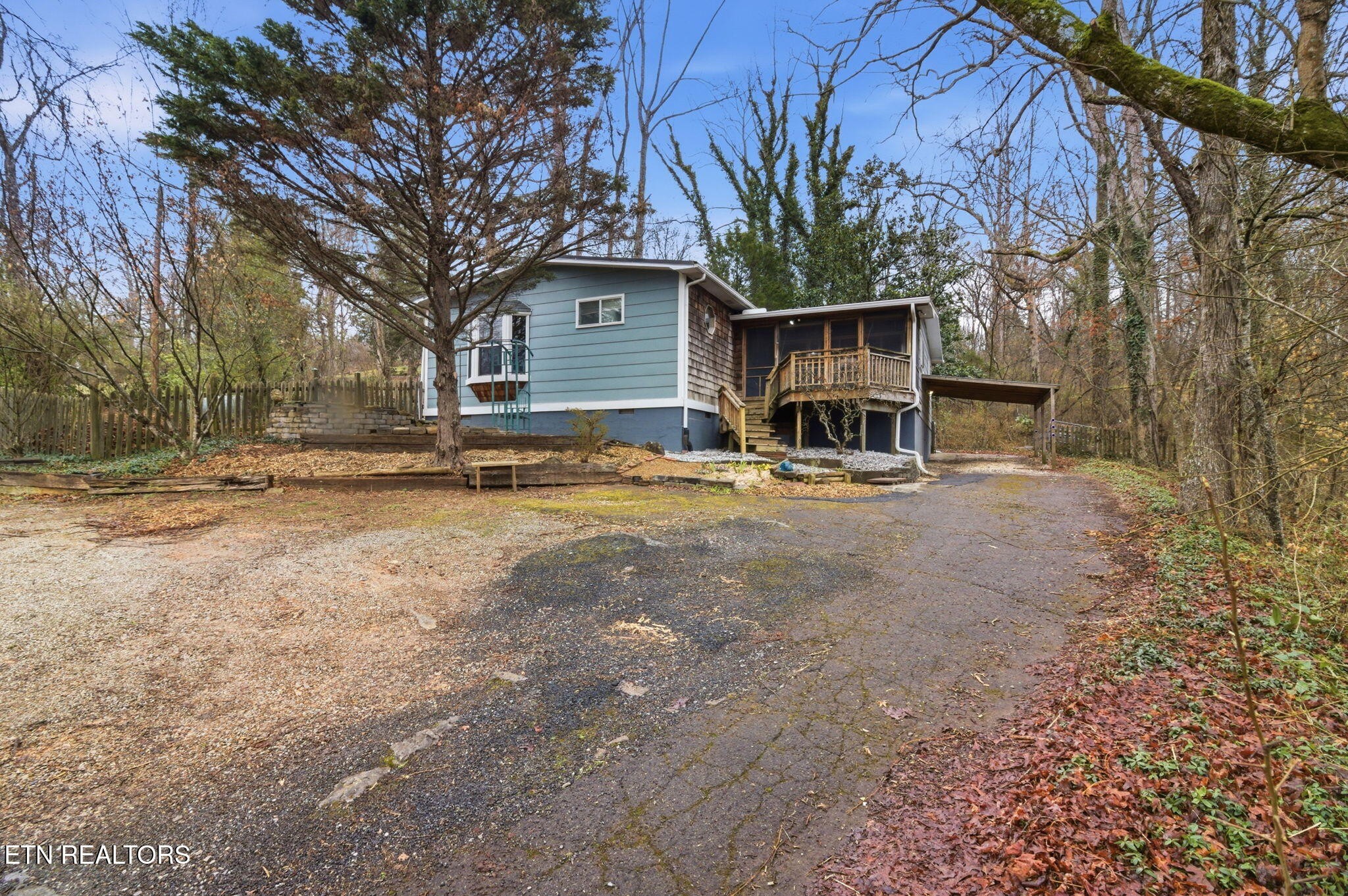 353 East Wolf Valley Road Heiskell, TN 37754 - Photo 25 of 34 a view of a house with backyard and trees
